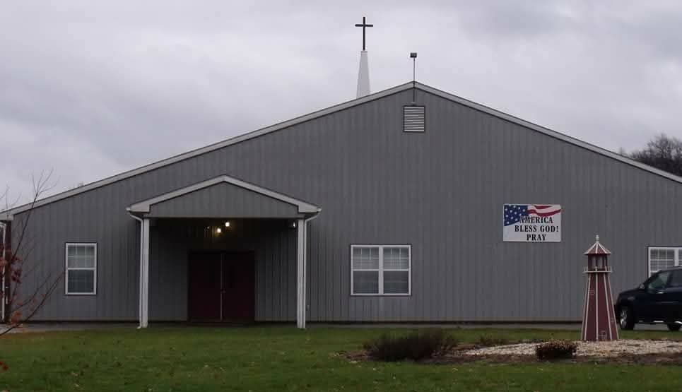 Front entrance and steeple of Paradisus Church of God in Thomasville, Pennsylvania.