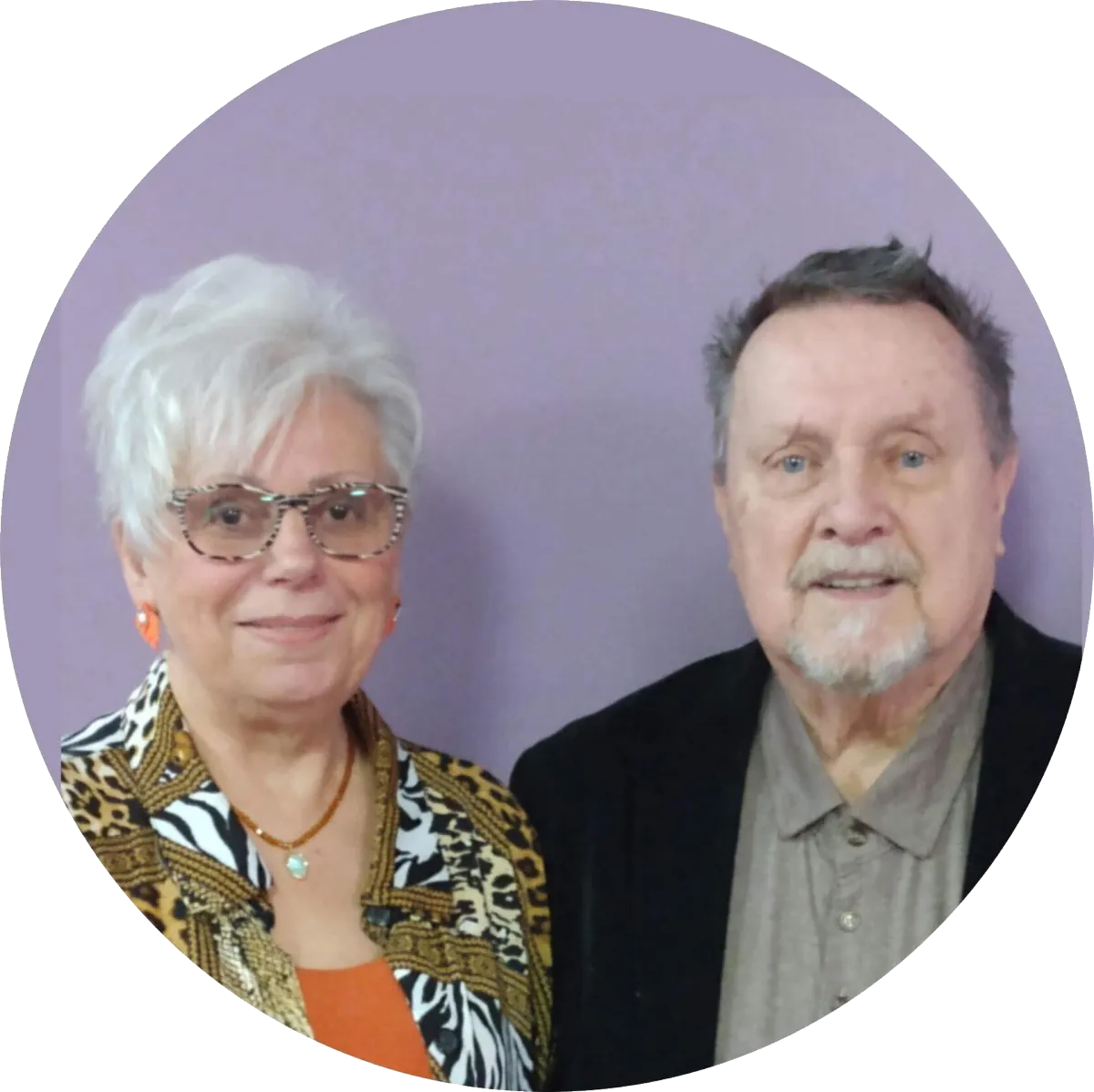 Joan and Pastor Richard Chronister pictured together against a lavender background.