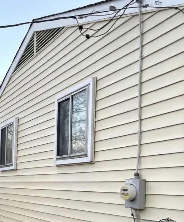 Vinyl house siding after professional house washing in St. Charles County, MO