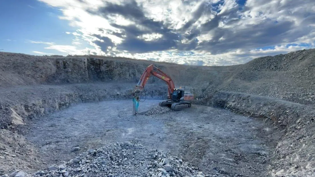 Excavator in open cut mine by Focus Hire