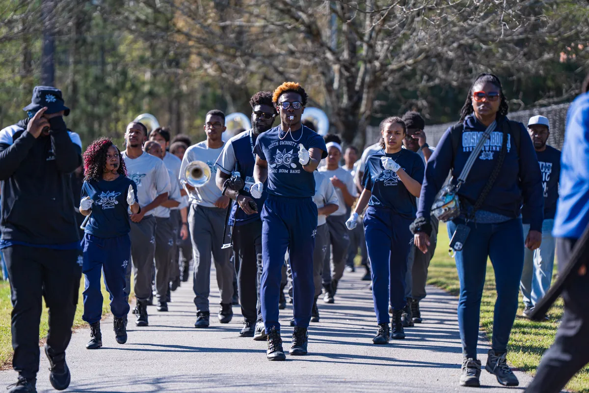 Marching band performing during the Gakobe Strong Snellville 5K Walk