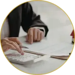 Person reviewing roofing estimate with calculator and documents for clear, detailed pricing discussion