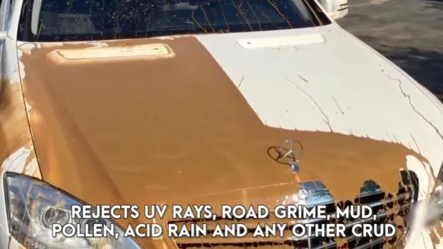 white car crossing body of water