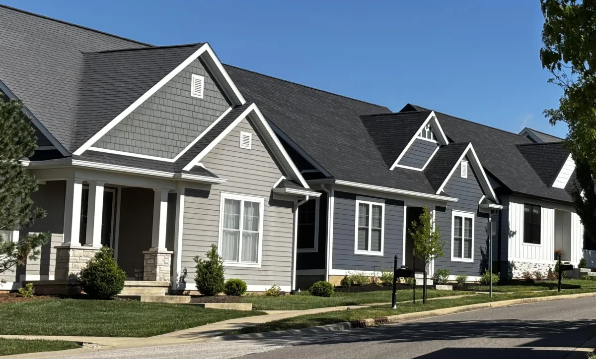 Row of houses in Renwick Gentry Crest in Bloomington Indiana with neighborhood street view