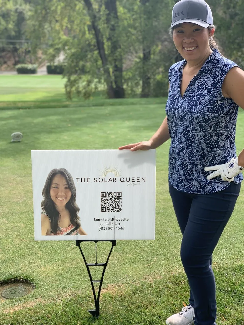 Jaime Greene the Solar Queen at a golf tournament sponsoring a golf hole.