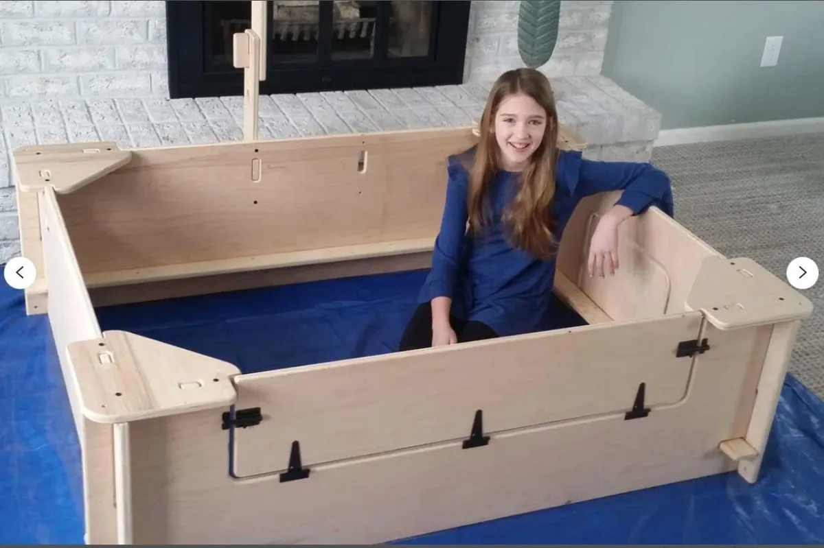 Girl in whelping box