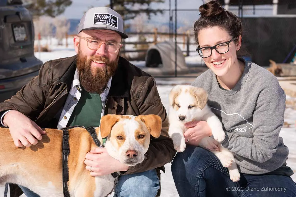Mother and son with new puppy