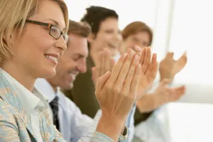 M&A Conferences group of people clapping