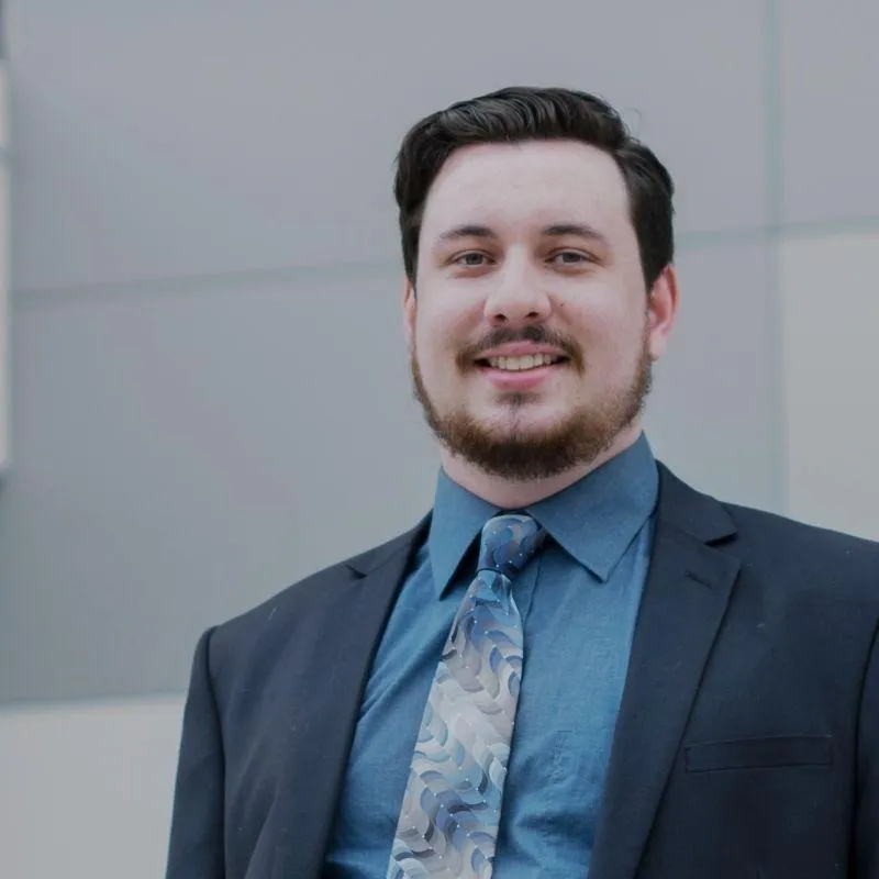 Headshot of Brendan McElroy, MA, Executive Director of HR M&A Roundtable.