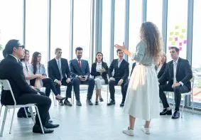 M&A expert leading exclusive Boston-only strategy session on AI and HR skills, delivering specialized merger intelligence to intimate group of integration professionals