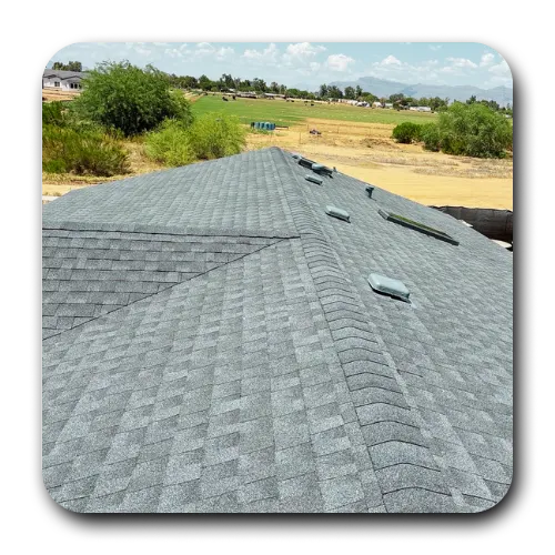 Large architectural shingle roof installation on a Scottsdale residence with valley flashing and roof vents.