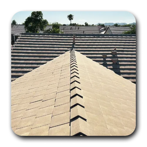Newly finished tile roof replacement in Scottsdale showing clean ridge lines and desert-toned concrete tiles.