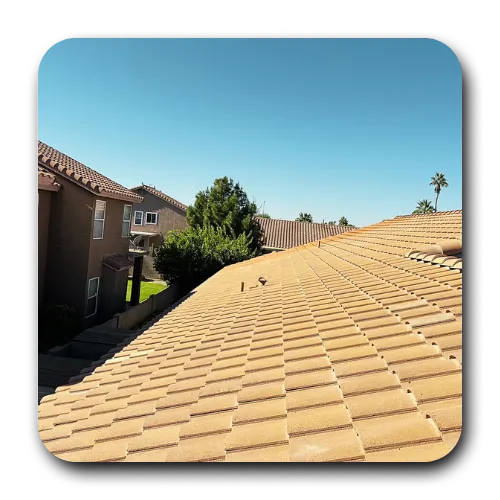 Arizona roofing contractors performing a roof inspection on a high-end Scottsdale home with curved clay tiles.