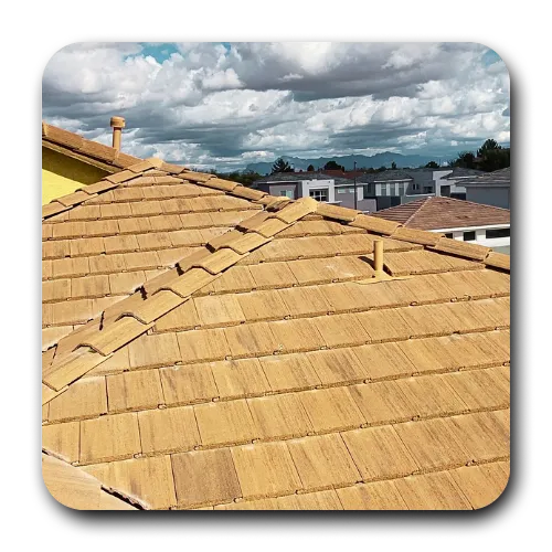 Newly finished tile roof replacement in Scottsdale showing clean ridge lines and desert-toned concrete tiles.
