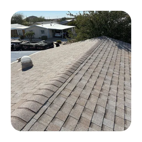 Large architectural shingle roof installation on a Scottsdale residence with valley flashing and roof vents.