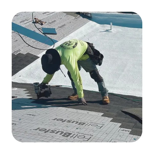 Scottsdale roofing crew installing asphalt shingles with high-quality underlayment on a multi-story home.