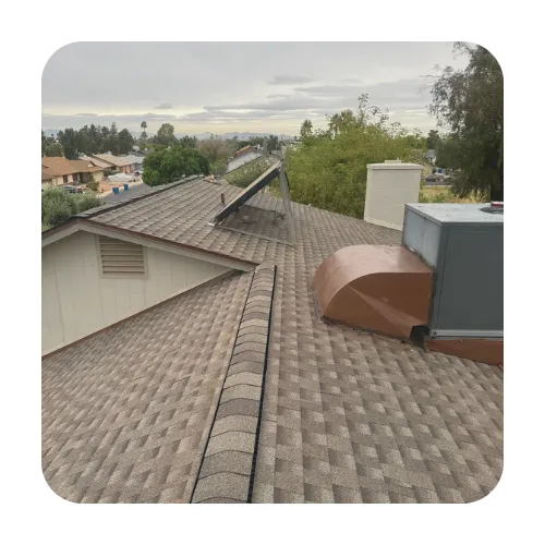 Newly finished tile roof replacement in Scottsdale showing clean ridge lines and desert-toned concrete tiles.