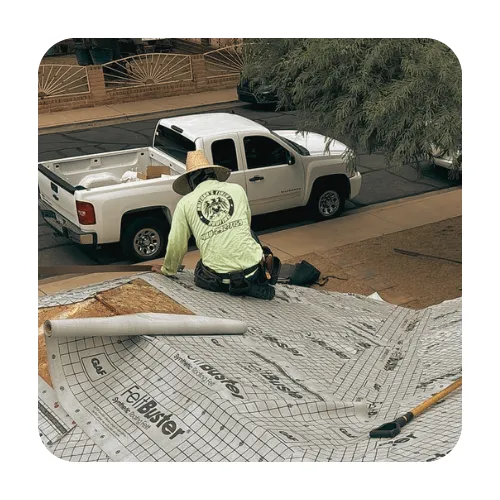 Local Gilbert roofer installing GAF FeltBuster synthetic underlayment to provide superior leak protection for a residential roof.