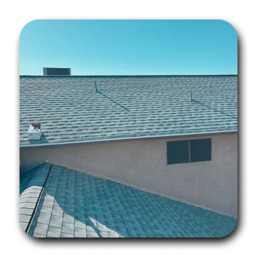 Architectural asphalt shingle roofing installation on a multi-level Chandler home, showing seamless valley transition.