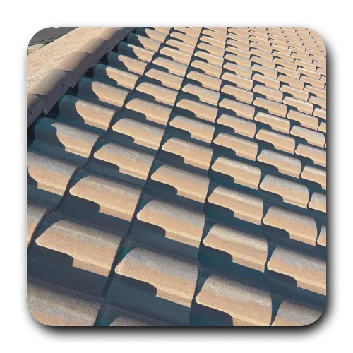 Close-up of shadow-patterned concrete roof tiles in Chandler, highlighting clean lines and durable desert-grade materials.