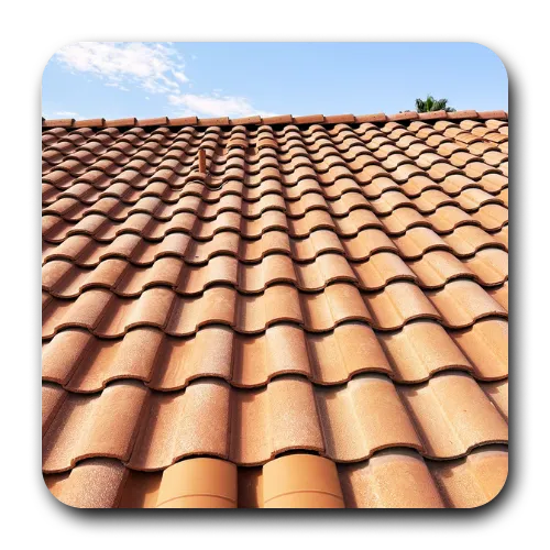 Professional tile roof inspection in Chandler, AZ, featuring gray flat concrete tiles and properly flashed plumbing vents.