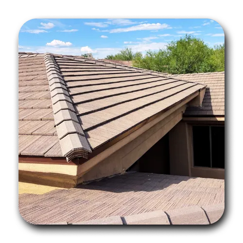 Close-up of concrete roof tiles and expert flashing work performed during a roof repair queen creek az to prevent leaks.