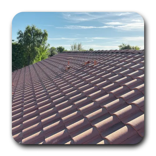 Red barrel tile roof installation on a residential home by best roofing contractors queen creek Arizona