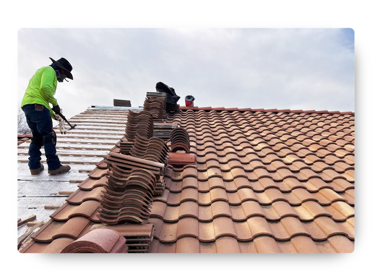 Skilled technician working on a tile roofing Scottsdale AZ installation for a residential roofing Scottsdale AZ property.