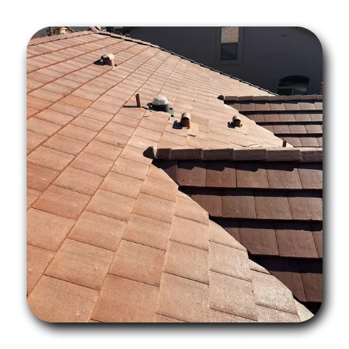 Multi-pitch brown concrete tile roof with pipe penetrations installed by a roofing contractor Tempe AZ.