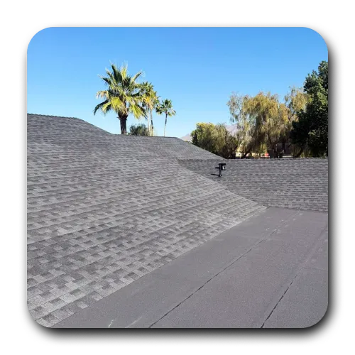 Combination of new grey shingle roofing and flat roofing surfaces installed by a roofing company Apache Junction AZ