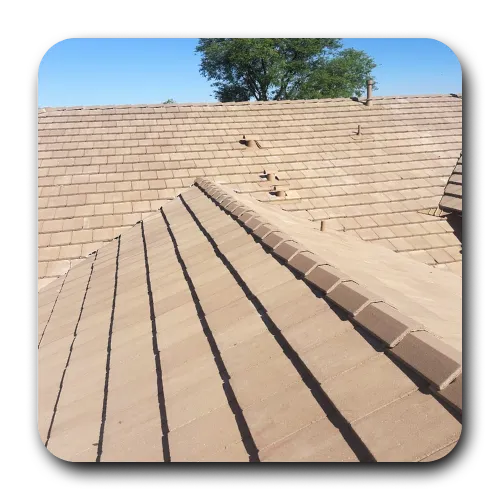 Overhead shot of pristine flat concrete tiles following routine roof maintenance Apache Junction AZ