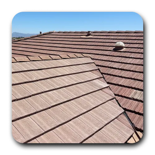 Multi-pitch flat tile roof structure after complete roof maintenance Florence AZ and restoration.