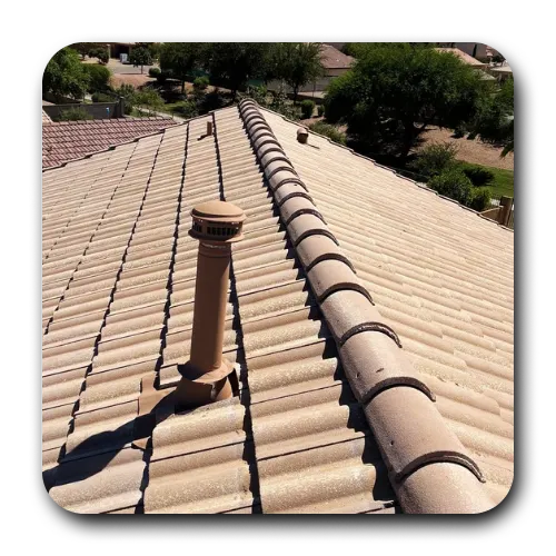 Newly completed tan concrete tile roof with ridge cap tiles and pipe vent installed by a roofing contractor Florence AZ.