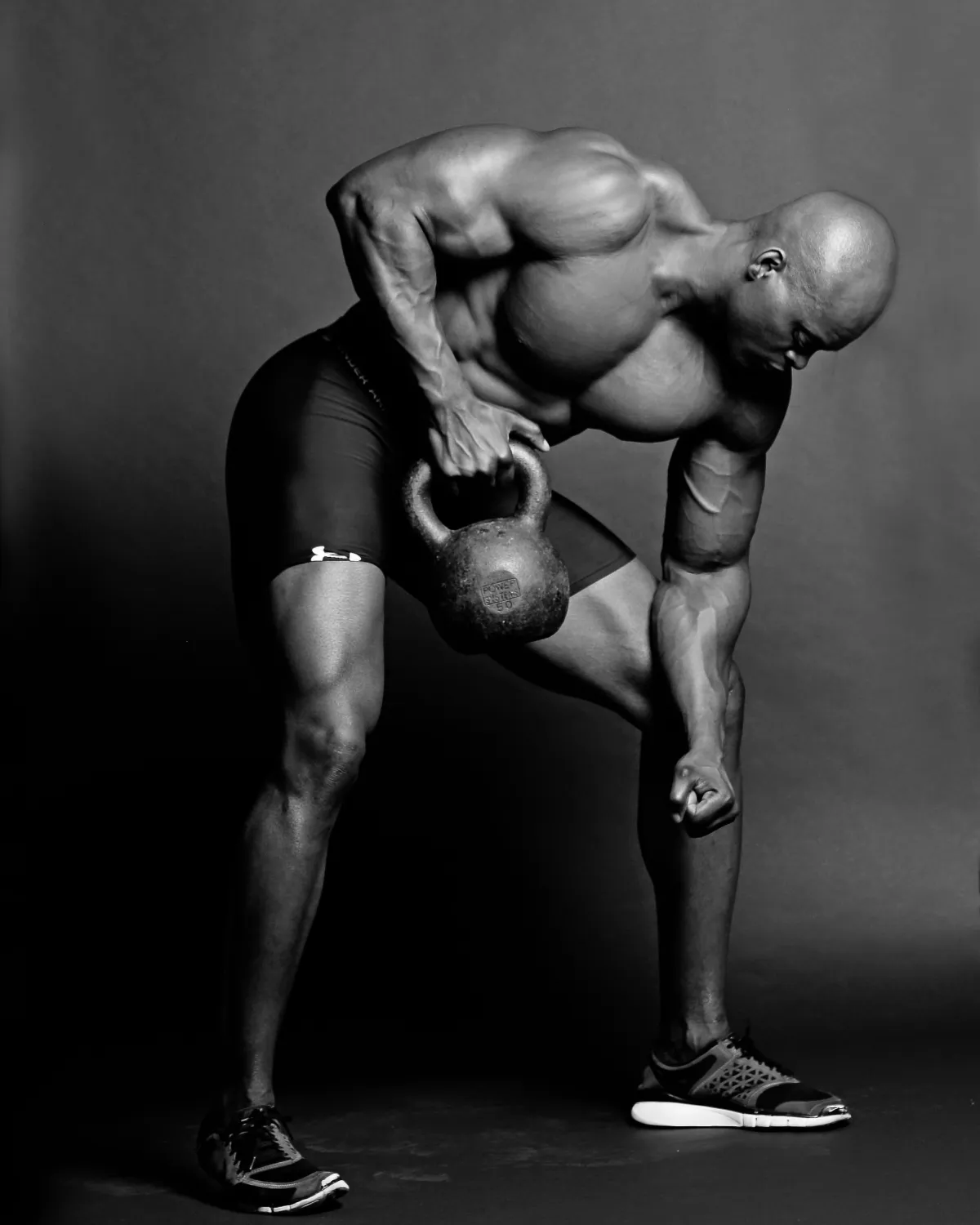 Coach Abraham of AFIT Personal Training Studio in Coral Springs showing muscular physique in fitness photoshoot.