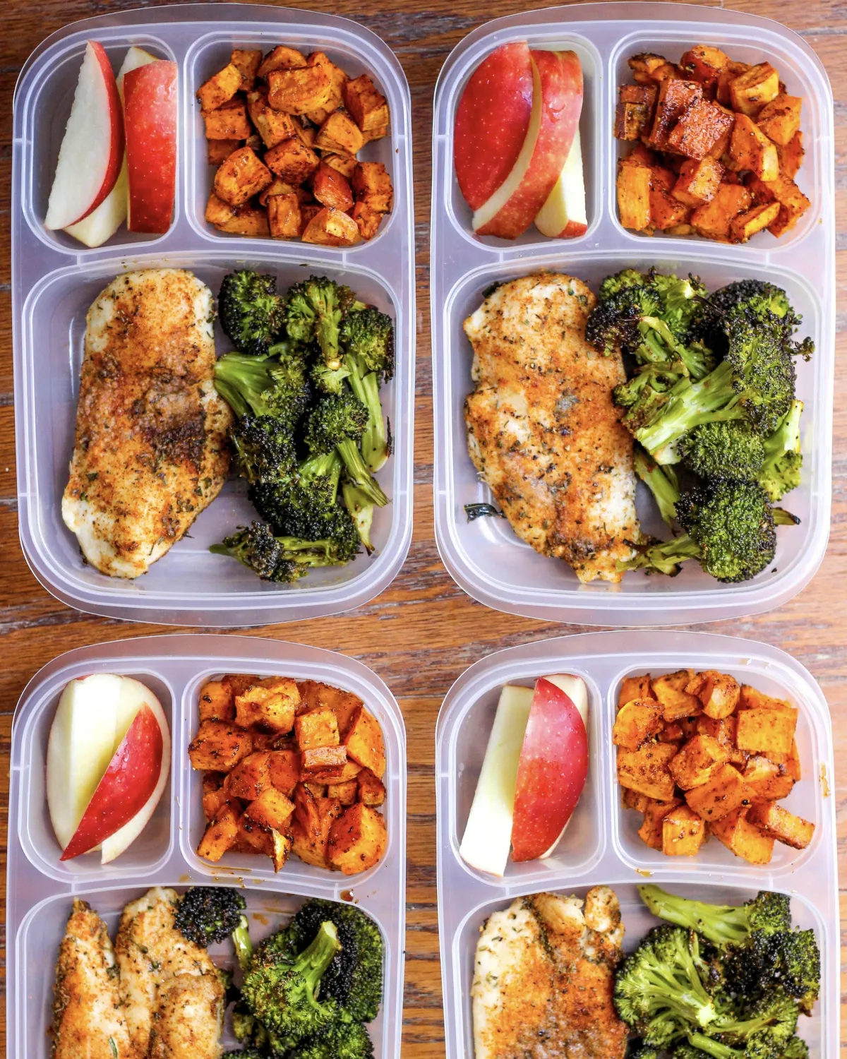 Meal planning containers with healthy, clean meals prepared for nutrition coaching clients at AFIT Personal Training Studio.