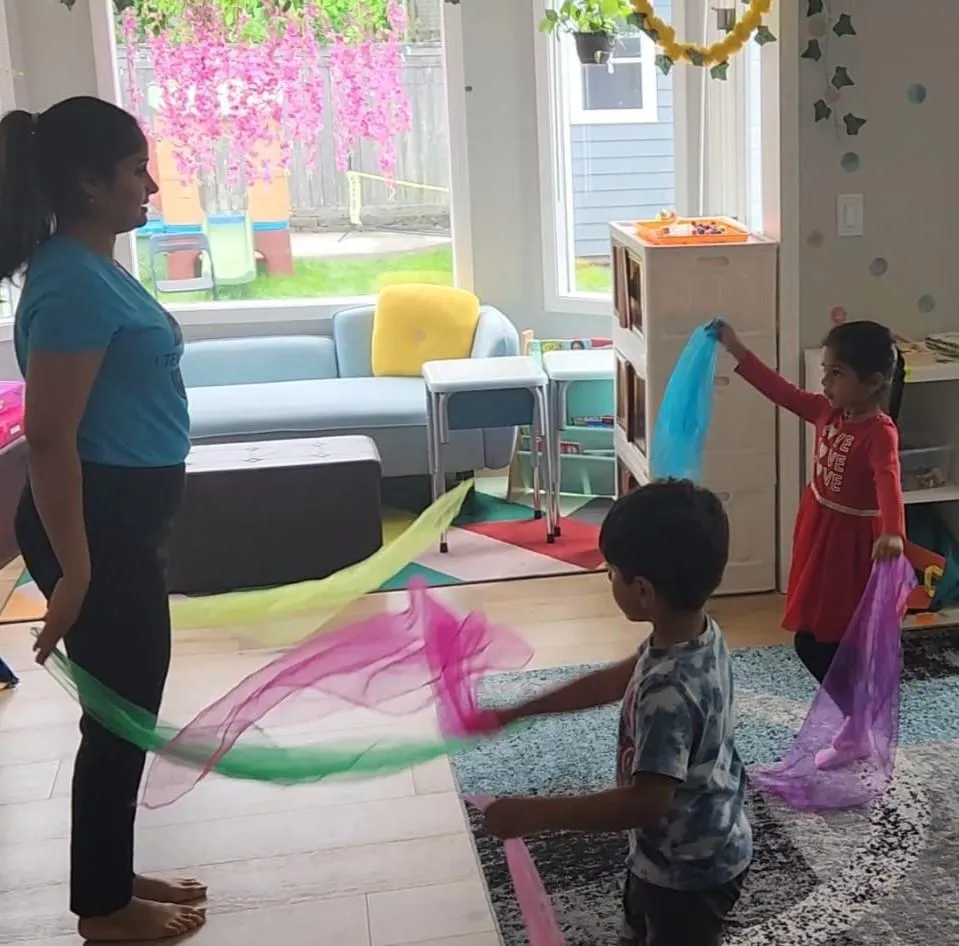 Girl follows directions during arts and crafts time.