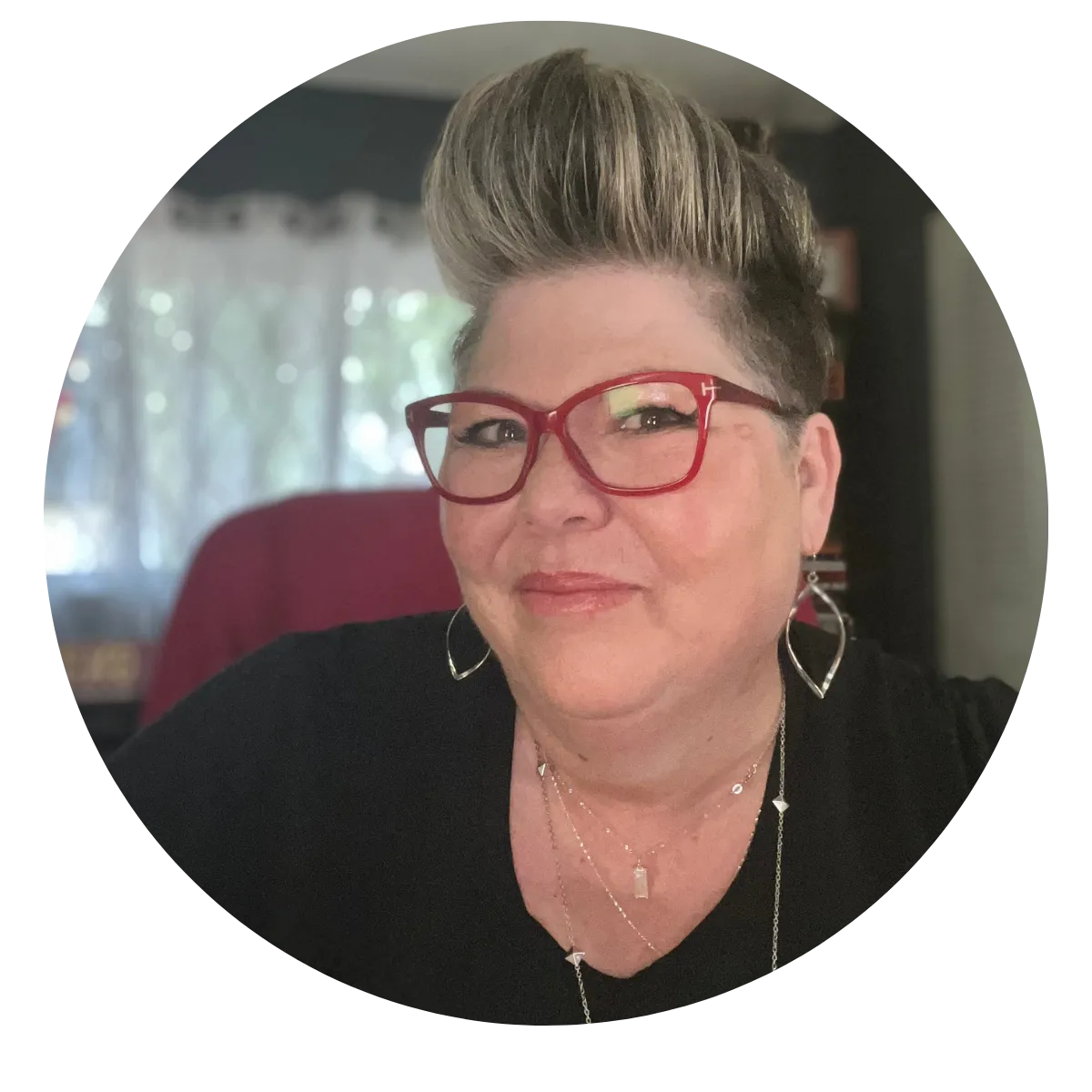 Coach Windy smiling in a warm, welcoming setting