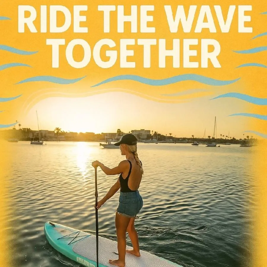 Ride the wave together, paddleboarding at sunset in New Smyrna Beach