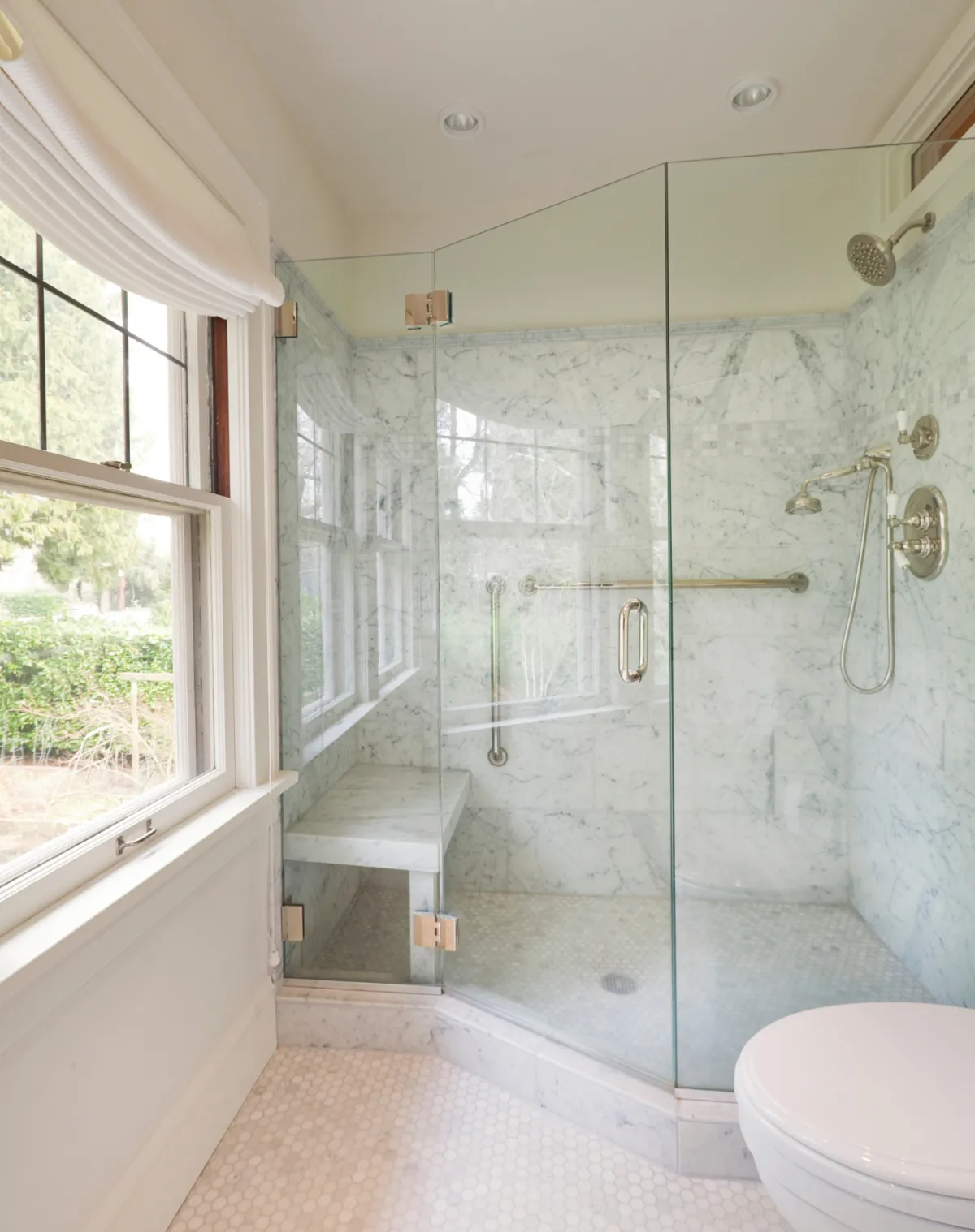 Elegant luxury home entrance featuring a grand custom front door with high-end finishes and timeless design.