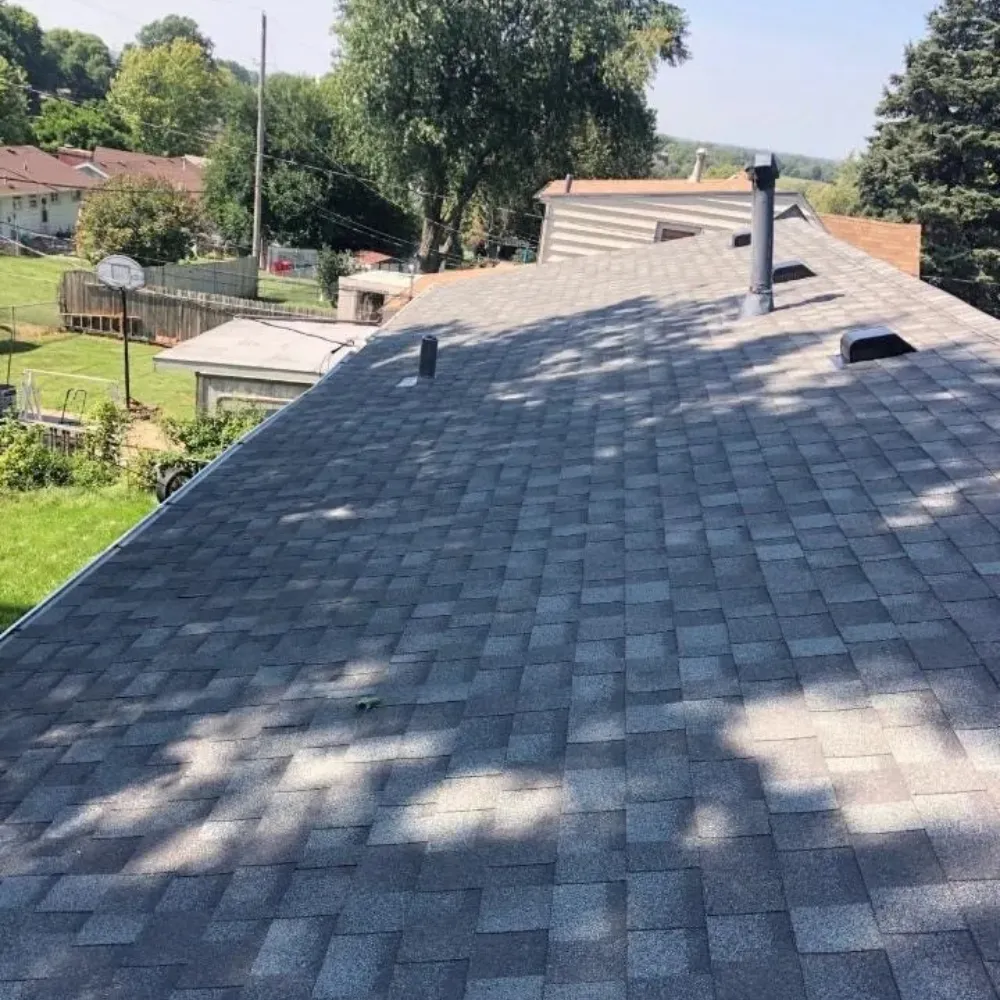 Modern single-family home featuring a sleek exterior, open floor plan, and custom design elements tailored for family living and functionality.