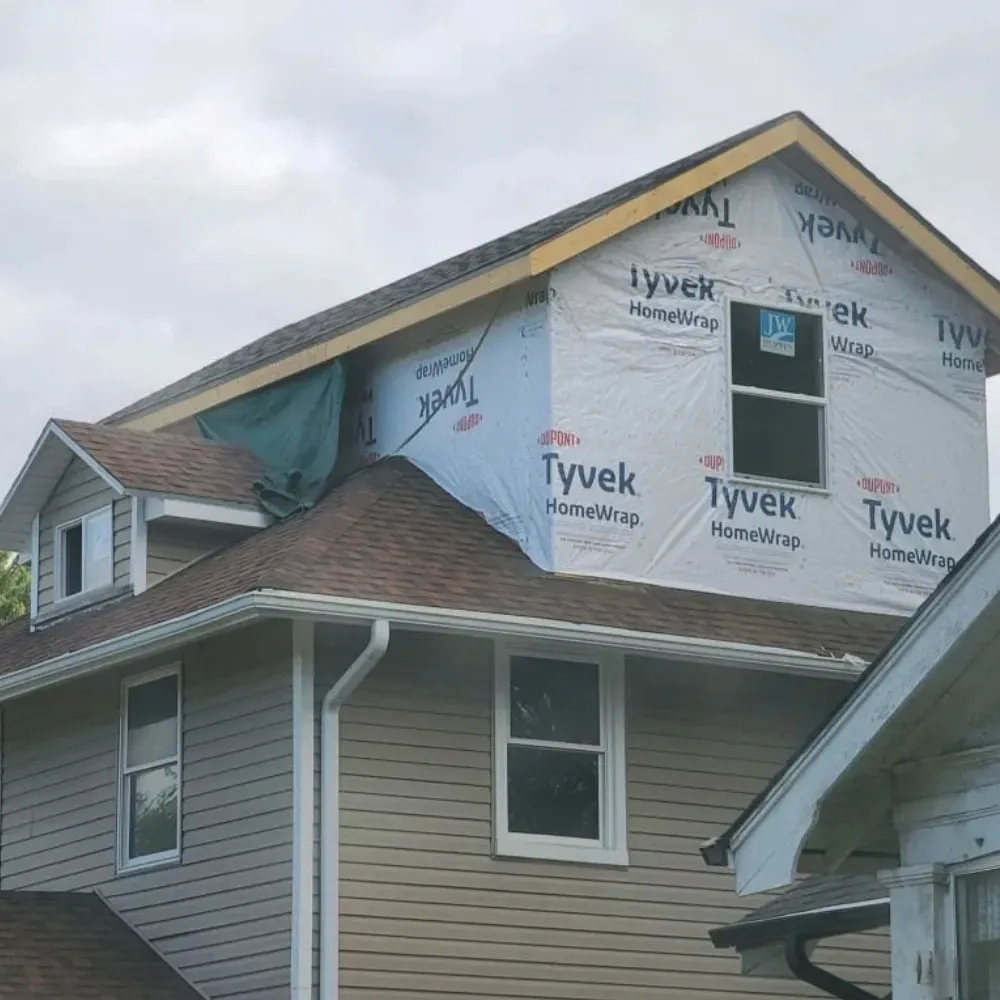 Custom home addition seamlessly blending with the existing structure, providing extra living space with high-quality craftsmanship and modern design.