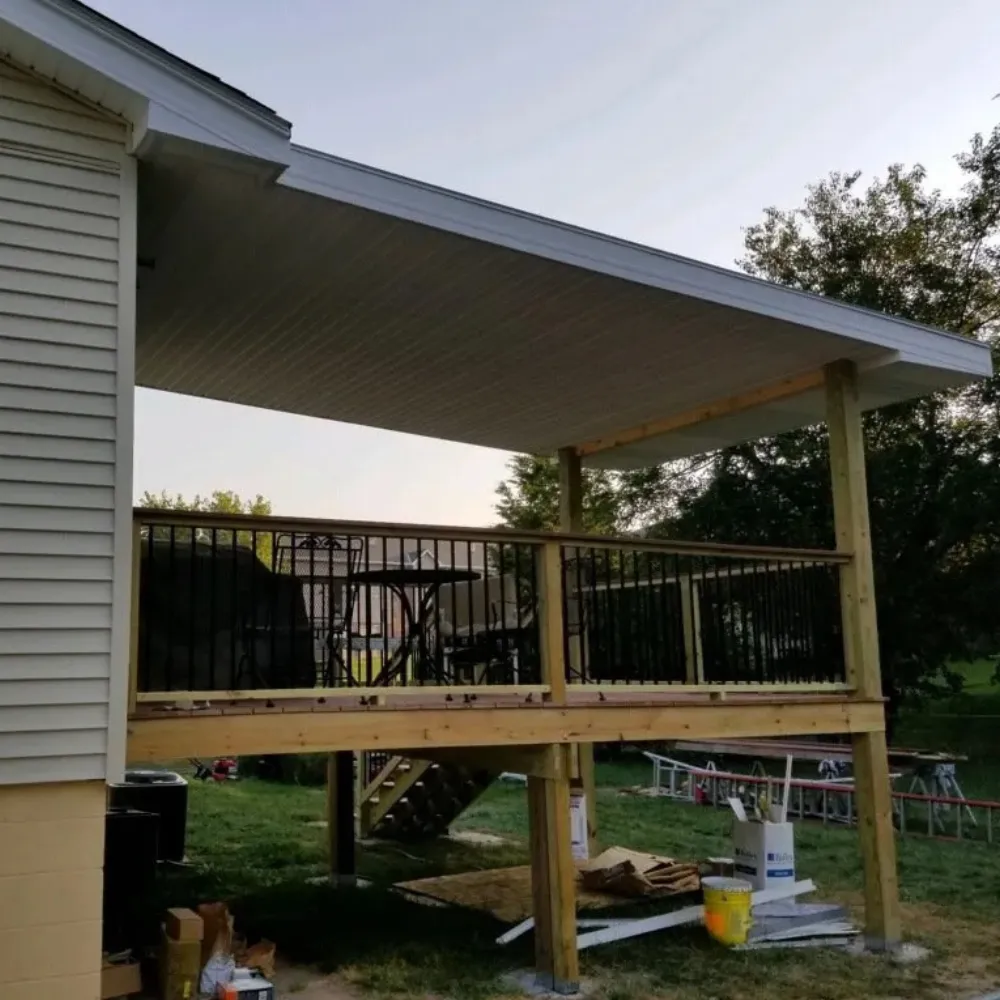 Custom home addition seamlessly blending with the existing structure, providing extra living space with high-quality craftsmanship and modern design.