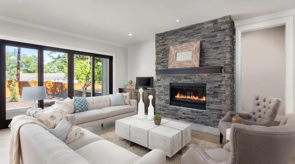 Charming custom suburban home with a spacious front yard, elegant architecture, and a warm, inviting design for comfortable family living.