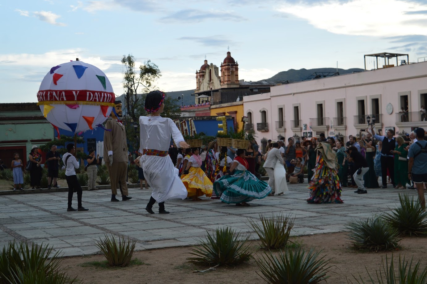 people dancing in the plaza