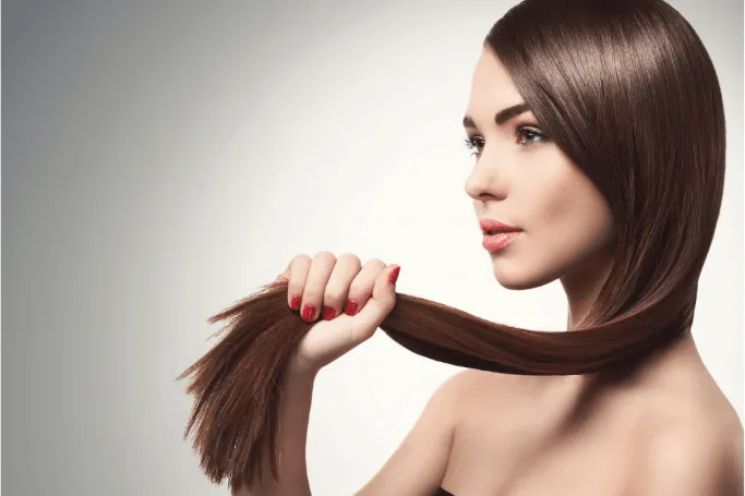 Reducing how often you wash your hair is one of the secrets to beautiful and healthy hair
