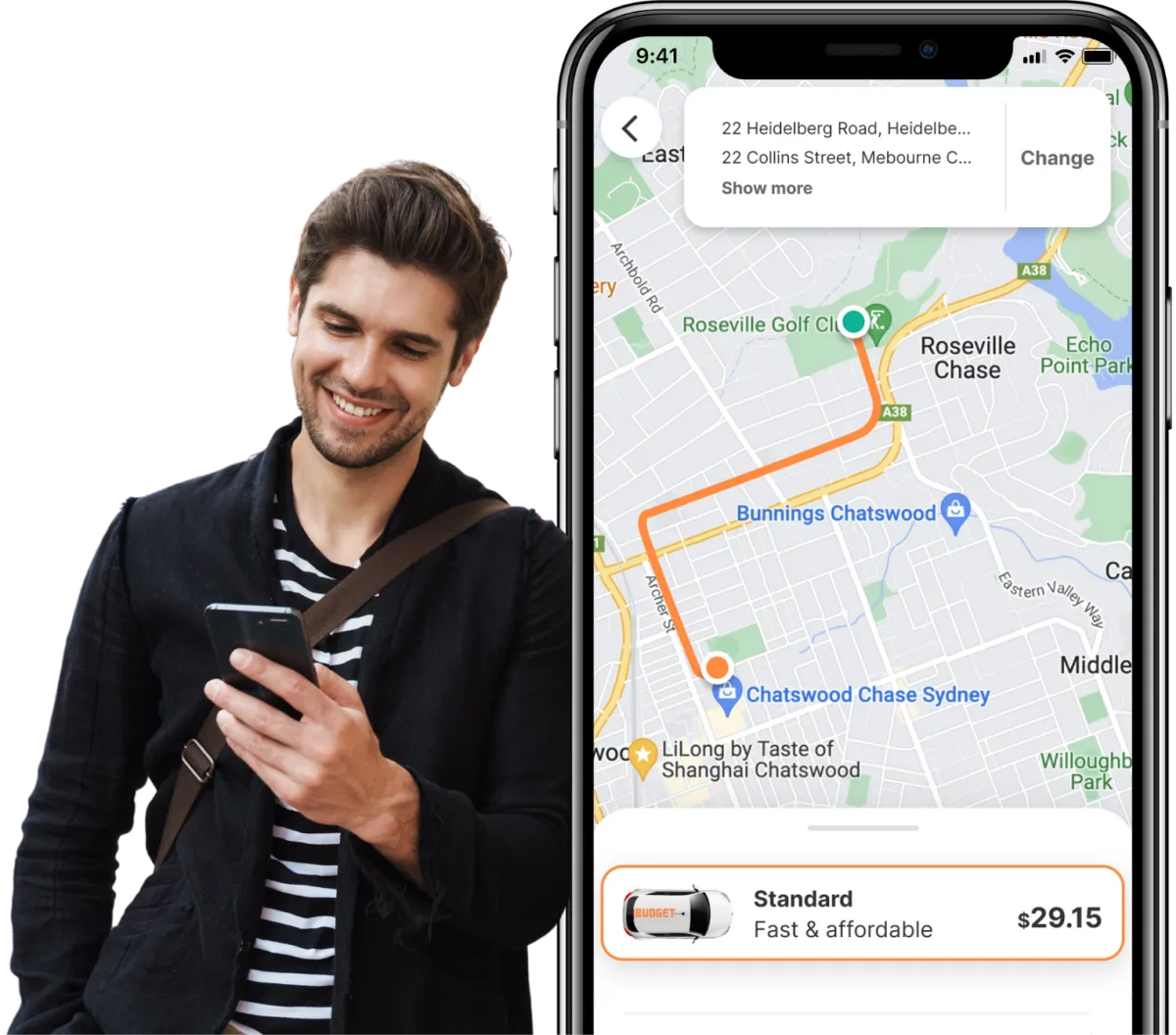Man smiling while viewing an affordable ride route on the Budget Ride app on his phone.