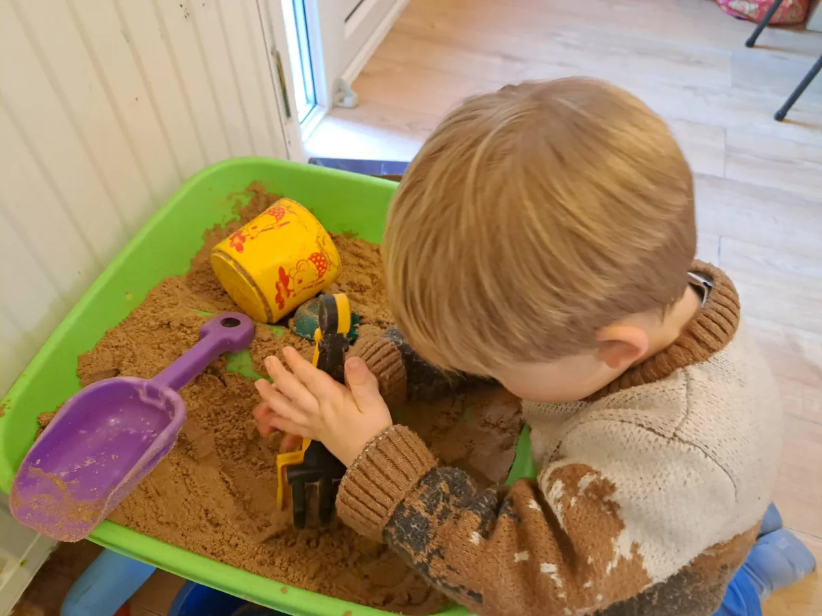 Playing with sand at Arise & Shine Childcare