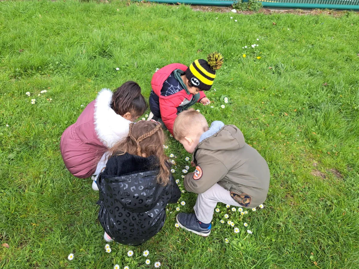 Children painting in Arise & Shine Childcare