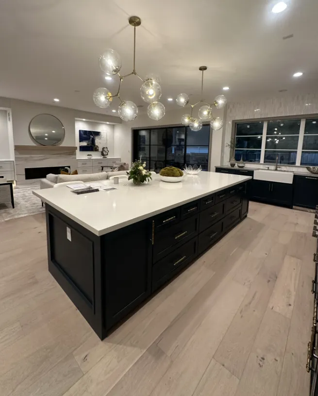 Modern kitchen interior with freshly painted white cabinets, colorful backsplash, and professional wall painting in Cypress, TX home