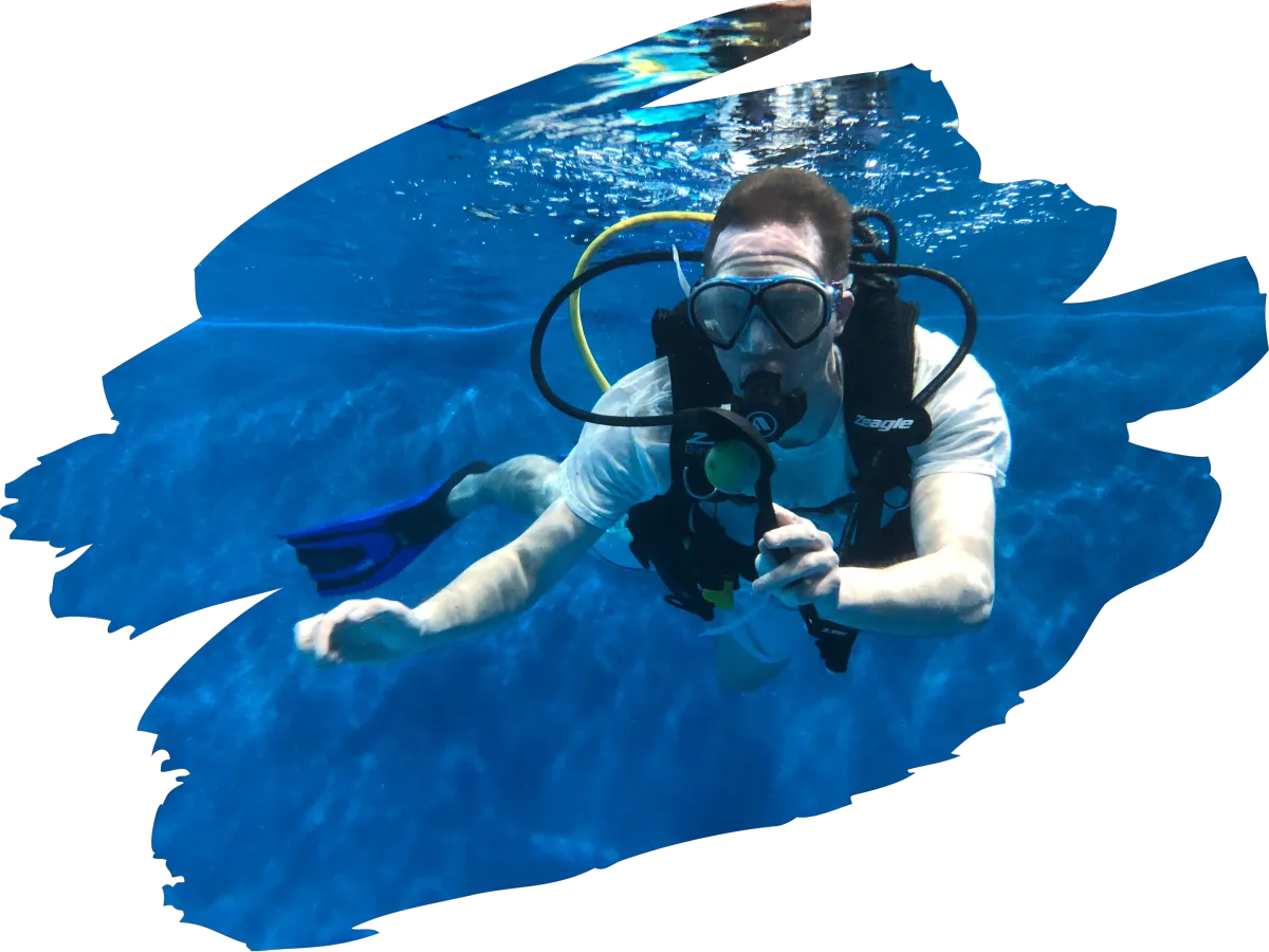 Two divers preparing to dive